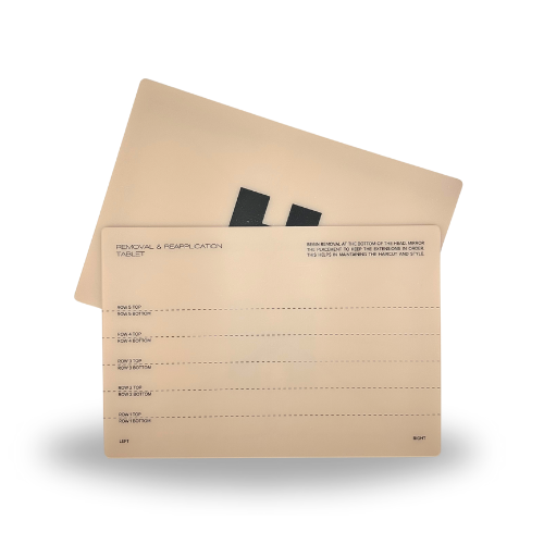 A pair of blank business cards featuring a minimalist black logo.