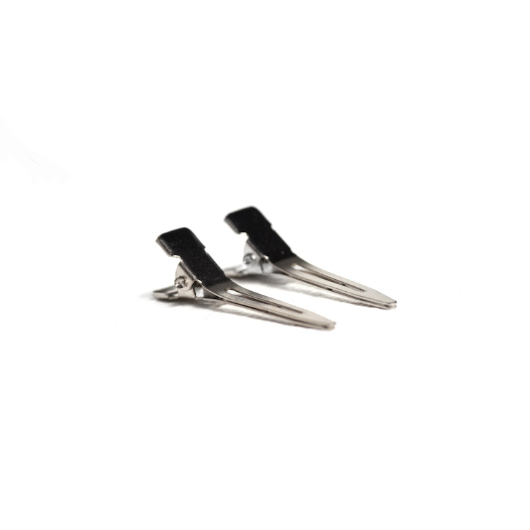 Two pairs of single-prong metal clips are displayed on a clean white background.