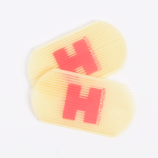 Two yellow and red velcro grippers featuring the "H" logo.