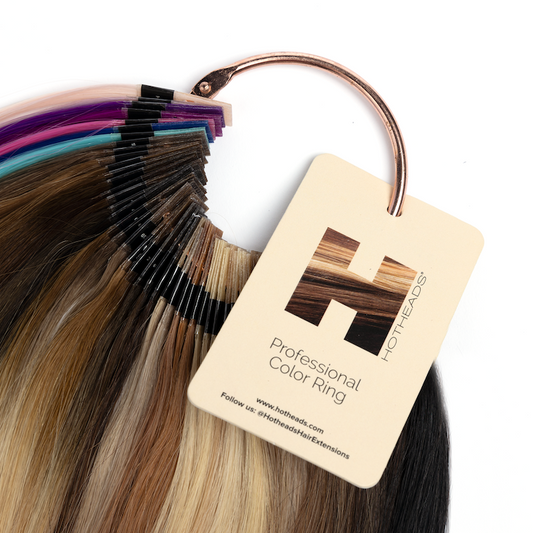 A pack of hair extensions featuring a tag labeled 'Professional Color Ring' for easy color identification.