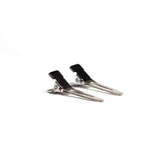 Two pairs of single-prong metal clips are displayed on a clean white background.