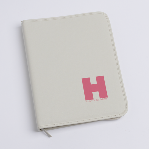 A white leather case featuring a pink letter "H" prominently displayed on its cover.